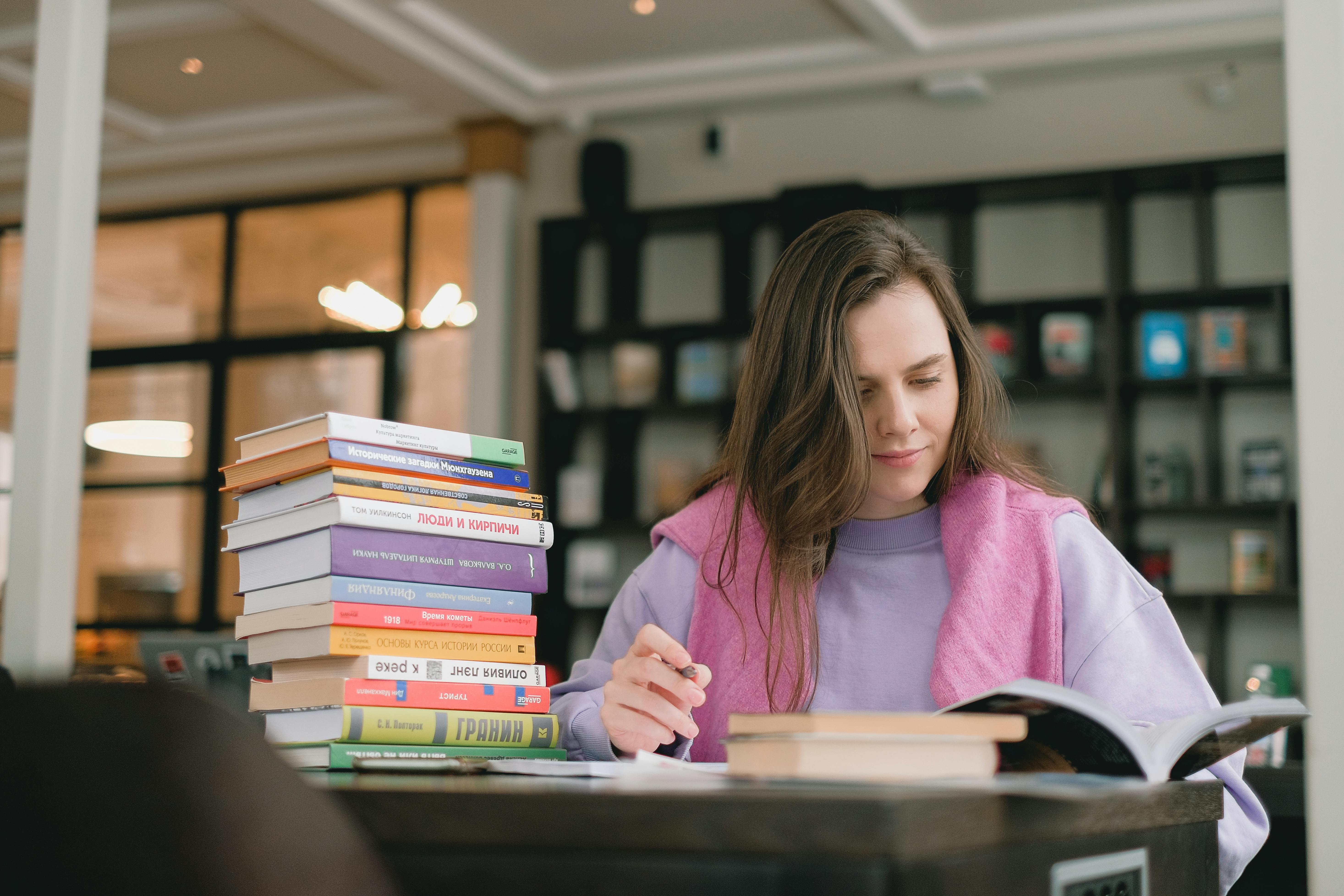 young woman studying in libaray